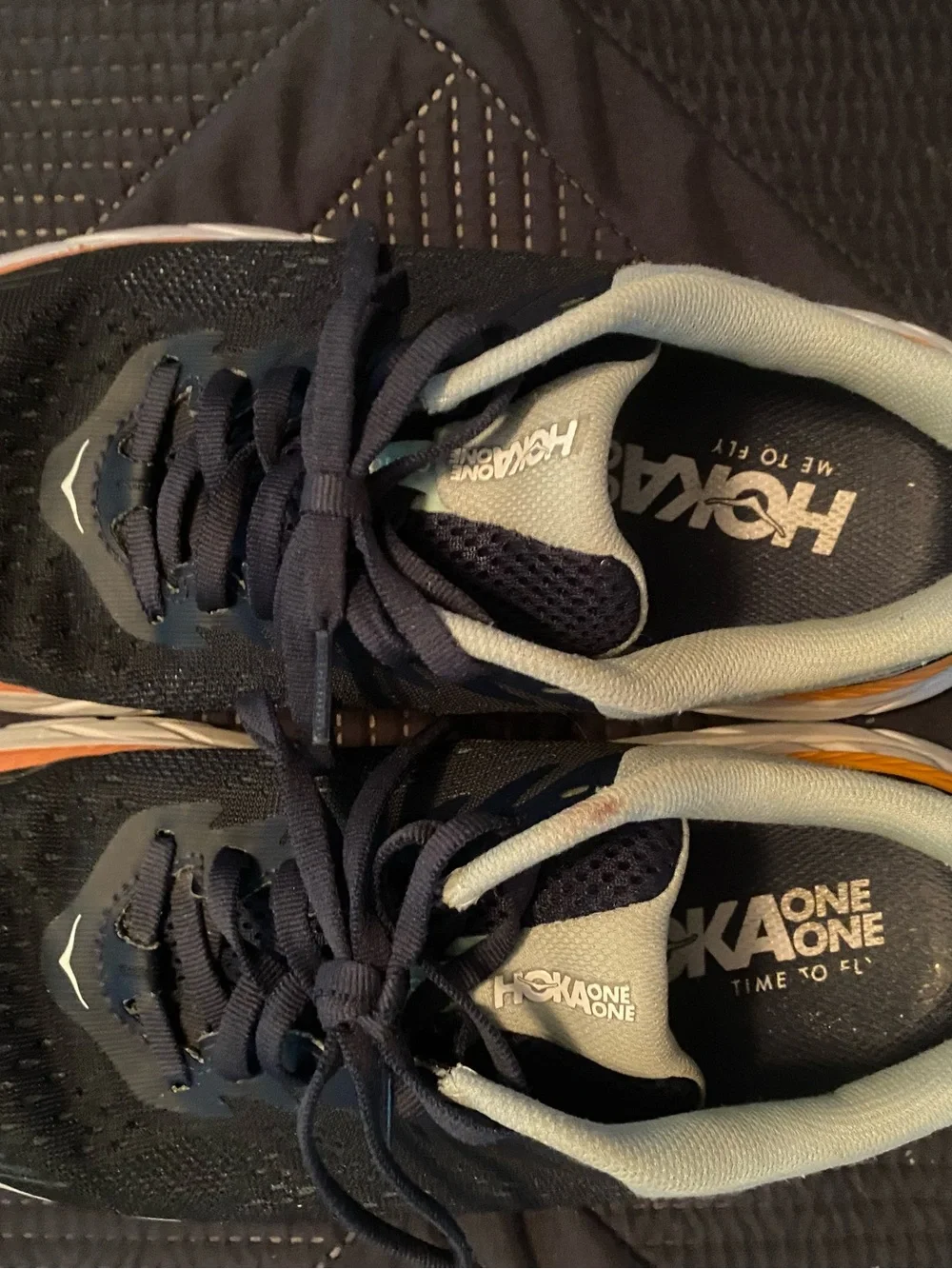 Hoka Running Sneakers in Black with Orange and White Details